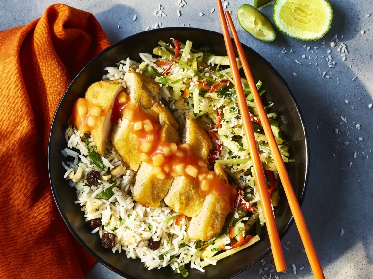 Sweer and sour Quorn Tempura Vegetarian Chicken fillets topped with a spring onion pineapple salsa sat on a bed of cashew rice.