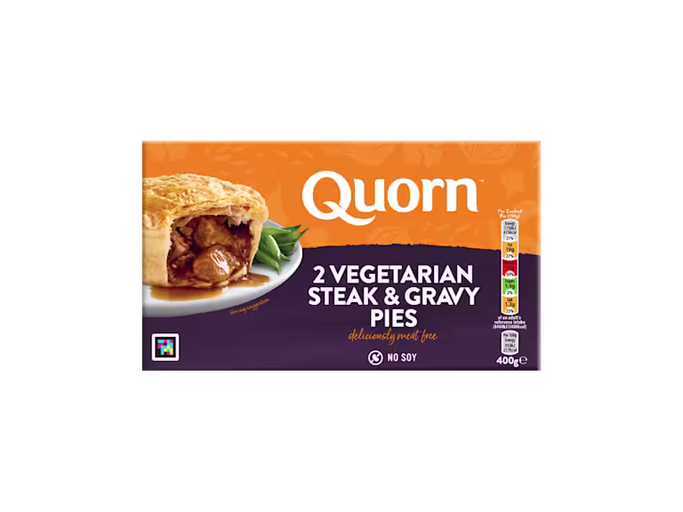 A box of Quorn Steak & Gravy Pies showing the prepared product and information on an orange and charcoal background.
