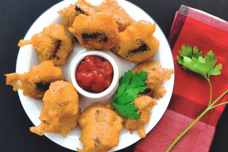 Quorn Vegetarian Battered Sausage Bites, made with Quorn Sausages and served ketchup