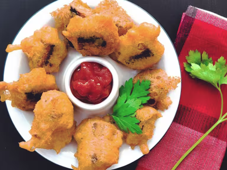 Quorn Vegetarian Battered Sausage Bites, made with Quorn Sausages and served ketchup