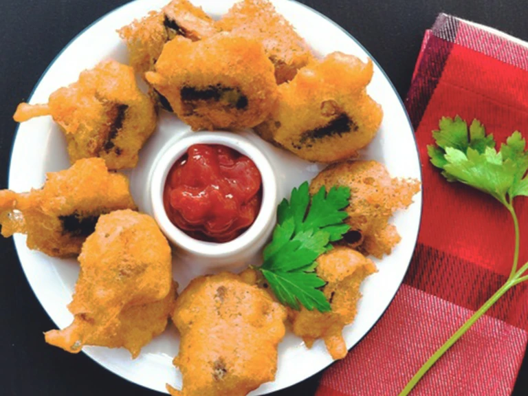 Quorn Vegetarian Battered Sausage Bites, made with Quorn Sausages and served ketchup