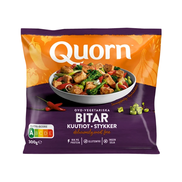 A bag of Quorn Pieces showing the prepared product and information on an orange and charcoal background.