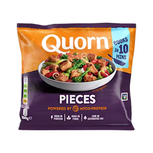A bag of Quorn Pieces showing the prepared product and information on an orange and charcoal background.