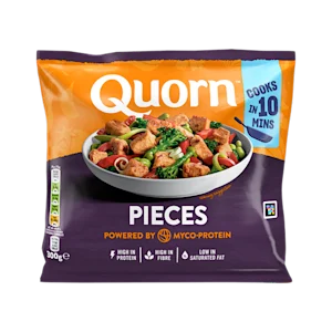 A bag of Quorn Pieces showing the prepared product and information on an orange and charcoal background.