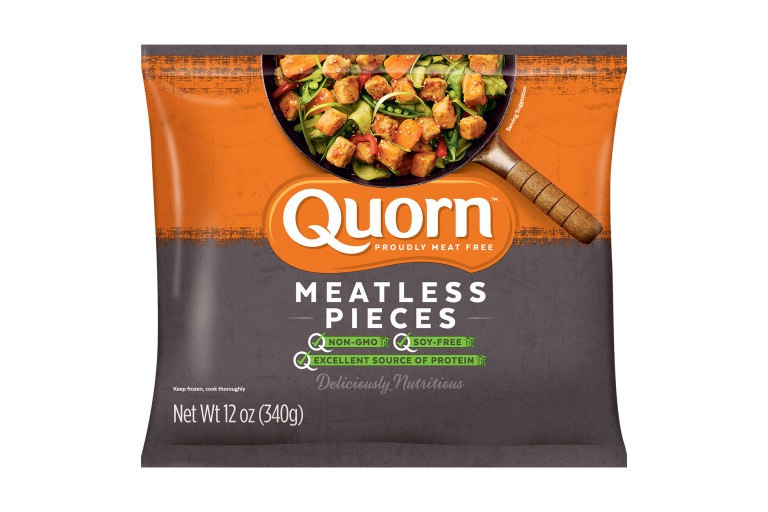 A bag of Quorn Meatless Pieces showing the plated product and information on an orange and charcoal background.