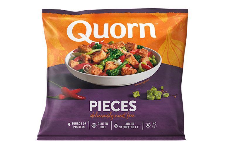 A bag of Quorn Pieces showing the prepared product and information on an orange and charcoal background.