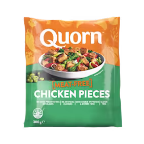 A bag of Quorn Pieces showing the prepared product and information on an orange and charcoal background.