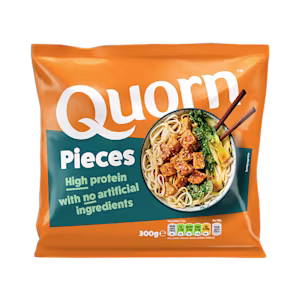 A bag of Quorn Pieces showing the prepared product and information on an orange and charcoal background.