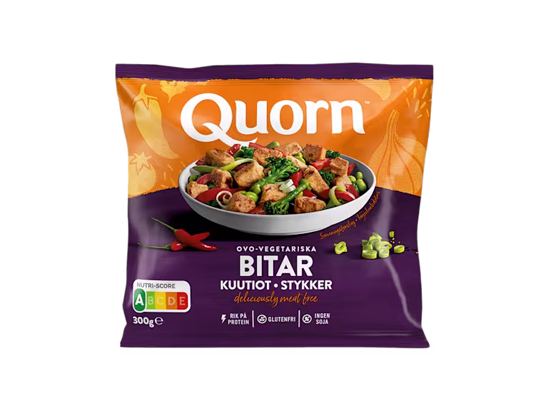 A bag of Quorn Pieces showing the prepared product and information on an orange and charcoal background.