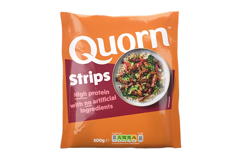 A packet of Quorn Vegetarian Steak Strips showing the plated product and information on an orange and charcoal background.