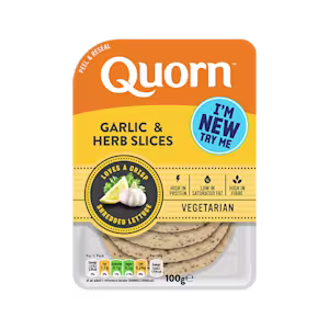 Orange Quorn Garlic & Herb Slices peel and reseal packaging, with a blue new product label and serving suggestion of lemon, shredded lettuce and garlic.