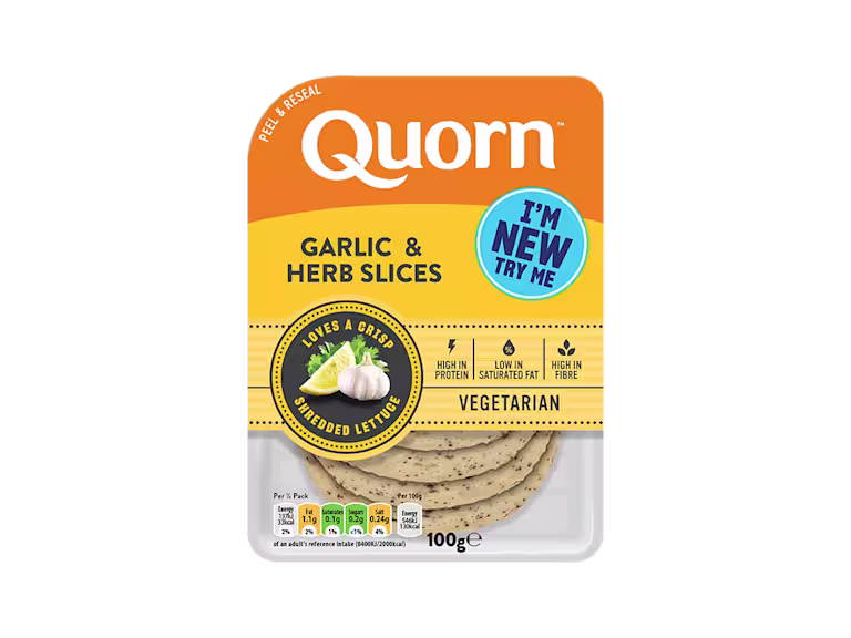 Orange Quorn Garlic & Herb Slices peel and reseal packaging, with a blue new product label and serving suggestion of lemon, shredded lettuce and garlic.