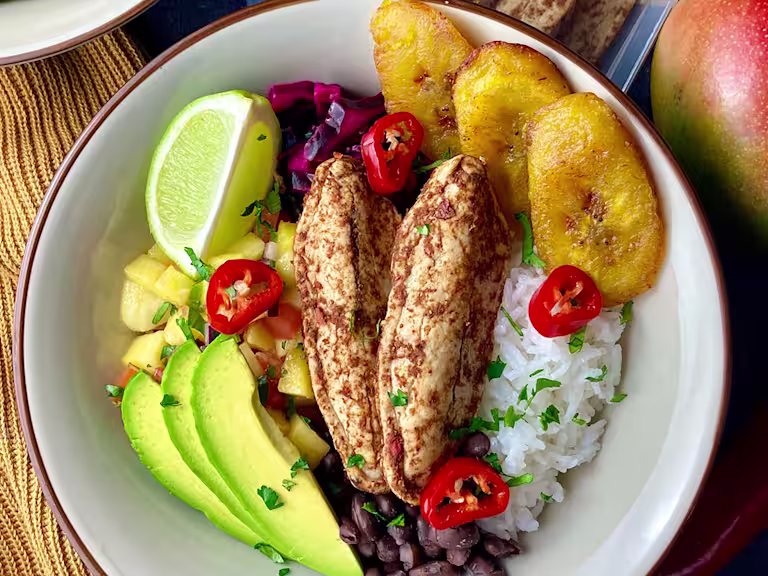 Quorn Fajita Mini Fillet poke bowl served topped with red chillies and served in a white bowl