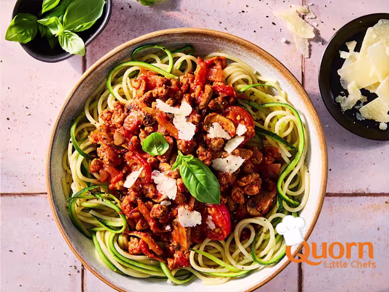 Quorn Courgetti Bolognese, made with Quorn Mince, carrots, mushrooms, celery and onion, served on a plate