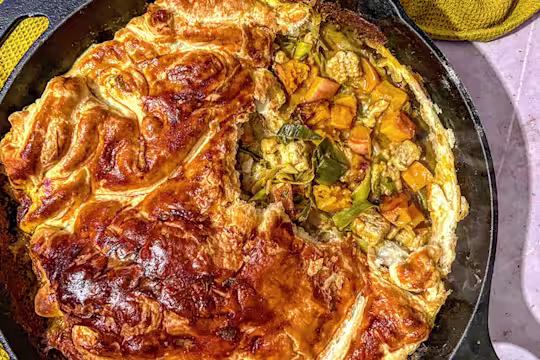 Creamy Korma Quorn Pieces, Leek and Caramelised Butternut Squash pie served in a skillet dish.