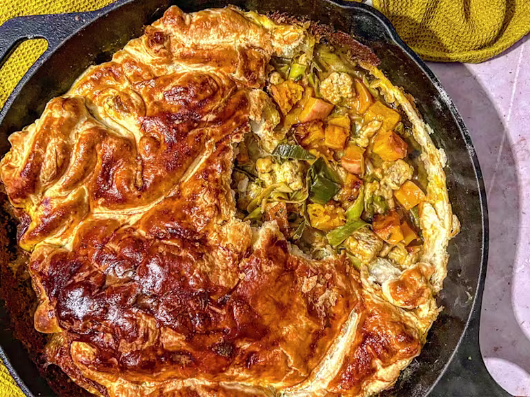 Creamy Korma Quorn Pieces, Leek and Caramelised Butternut Squash pie served in a skillet dish.