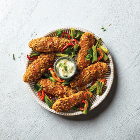 Quorn Salt and Pepper Tenders, served with hot honey-glazed baby red peppers and spring onions and a pot of mayonnaise.