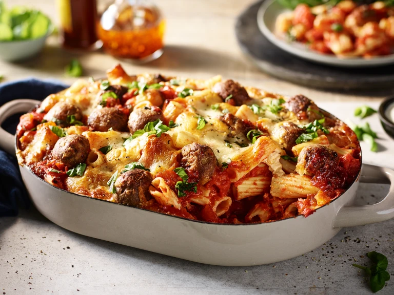 A pasta bake with a tomato sauce and Quorn Swedish Style Balls topped with cheese and coriander.