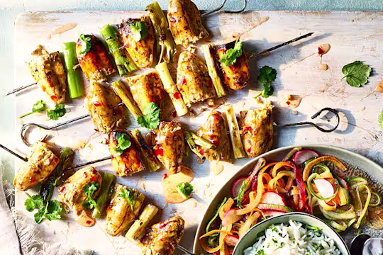Sweet Chilli Skewers served on a wooden board