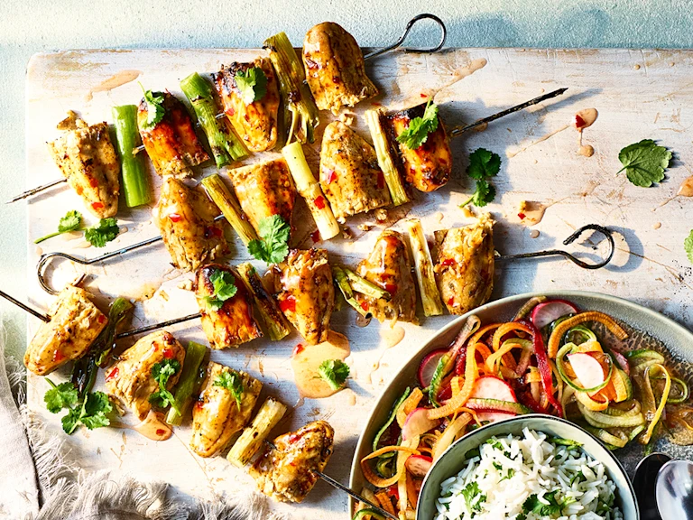 Sweet Chilli Skewers served on a wooden board
