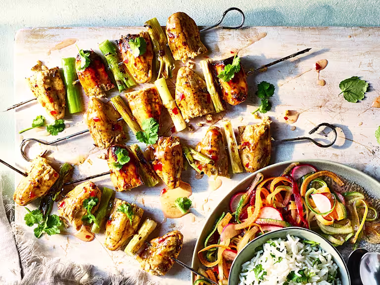 Sweet Chilli Skewers served on a wooden board