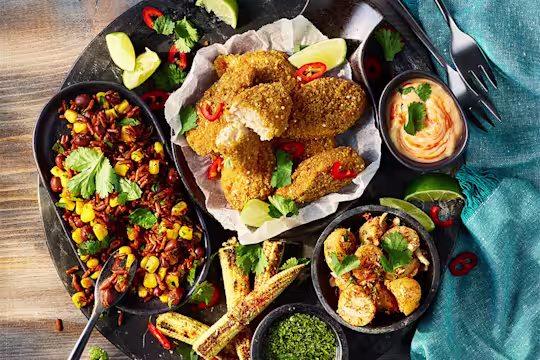 Quorn Cajun Wings Sharing Platter including various dips and sides.