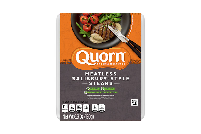 A package of Quorn Meatless Salisbury-Style Steaks showing the plated product and information on an orange and charcoal background.