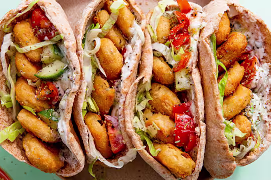 Quorn Crispy Nuggets with Salad and Tzatziki inspired yoghurt in 4 Wholemeal Pittas