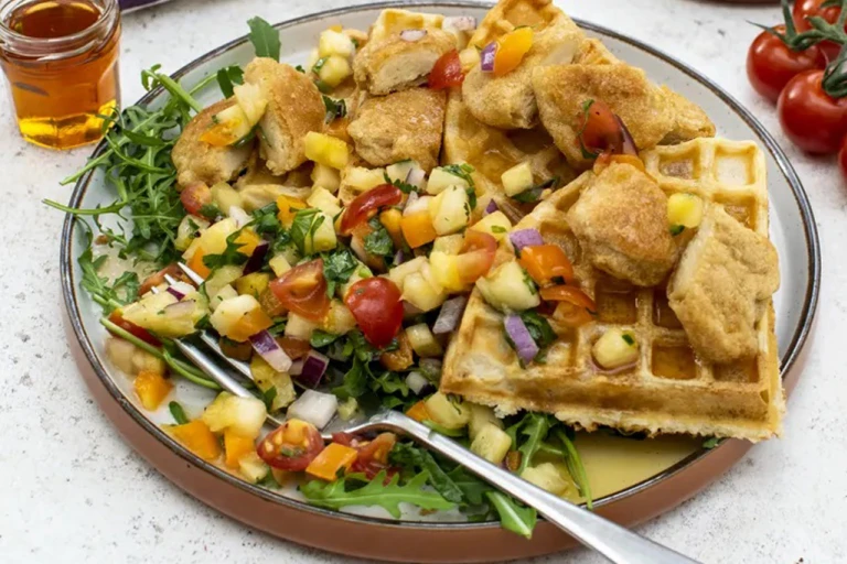 Quorn Crispy Nuggets "Chicken" Vegetarian Waffles served alongside pineapple salsa with Quorn Crispy Nuggets packaging displayed.
