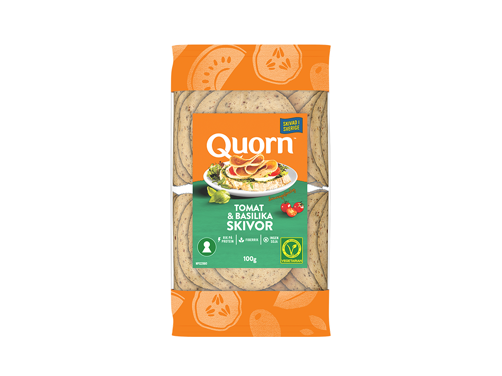 Orange Quorn Tomato & Basil Slices peel and reseal packaging, with a blue new product label and serving suggestion of panini, tomato and basil. 