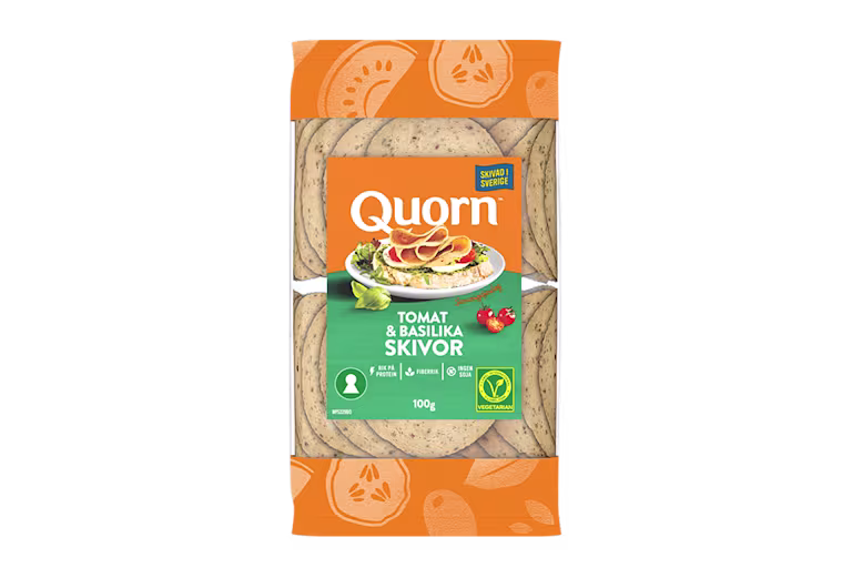 Orange Quorn Tomato & Basil Slices peel and reseal packaging, with a blue new product label and serving suggestion of panini, tomato and basil.