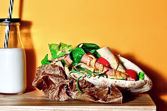 Quorn Vegan Deli Pitta slightly opened to show the filling including Quorn Smoky Ham Free Slices.