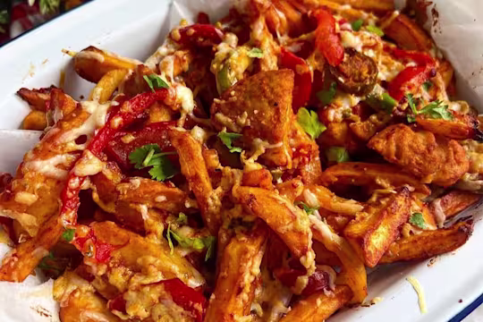 Chips coated in spicy peri-peri sauce, topped with Quorn Vegetarian fillets, peppers, onions and melted cheese.