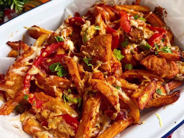 Chips coated in spicy peri-peri sauce, topped with Quorn Vegetarian fillets, peppers, onions and melted cheese.