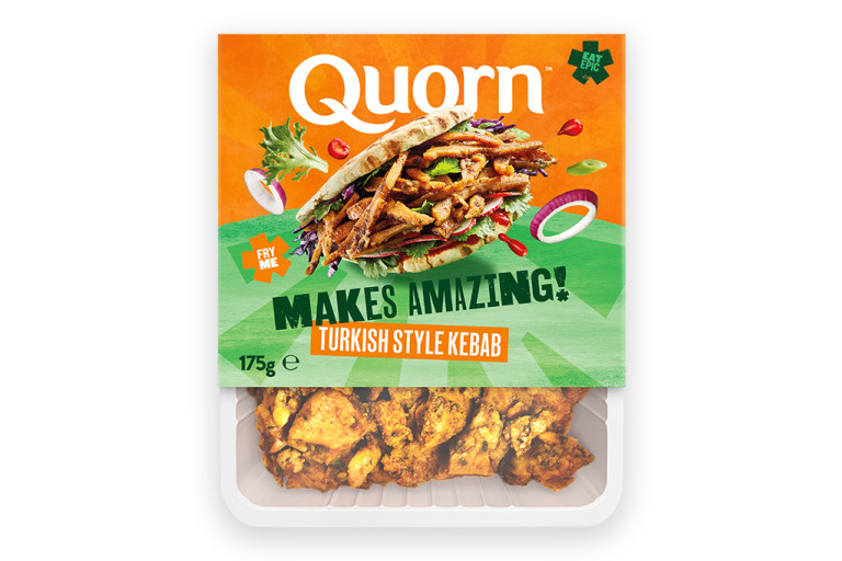 A packet of Quorn Makes Amazing Turkish Style Kebab with the product visible in the bottom third below an orange and light green label showing the prepared product and information.