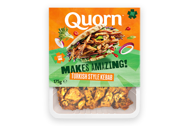 A packet of Quorn Makes Amazing Turkish Style Kebab with the product visible in the bottom third below an orange and light green label showing the prepared product and information.