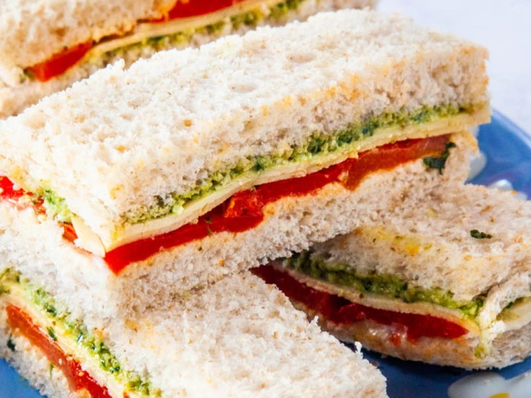 Vegan sandwiches stacked on top of each other.