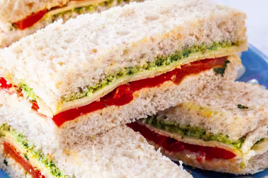Vegan sandwiches stacked on top of each other.