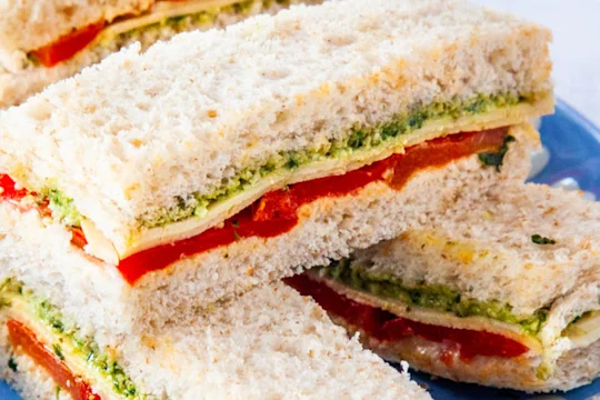 Vegan sandwiches stacked on top of each other.