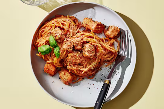 A large portion of Vegan One-Pot Pasta served in a white dish.