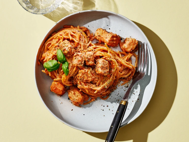 A large portion of Vegan One-Pot Pasta served in a white dish.