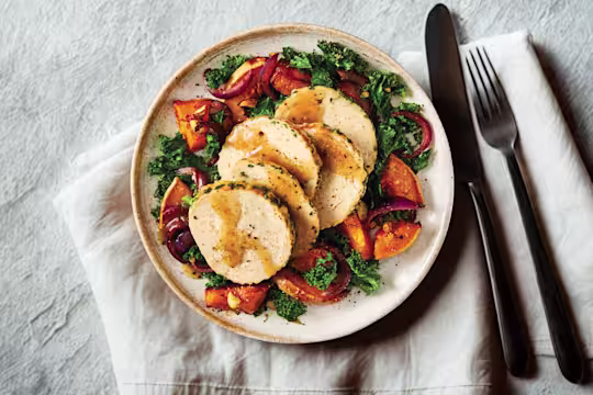 Quorn Roast with honey and horesradish glaze, served with roasted butternut squash, kale and gravy.