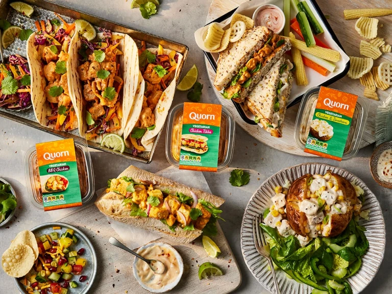 A range of Quorn sandwich fillers on a table with sandwiches and wraps.