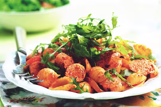 A shell pasta salad with Quorn Sausages, peppers, and rocket.