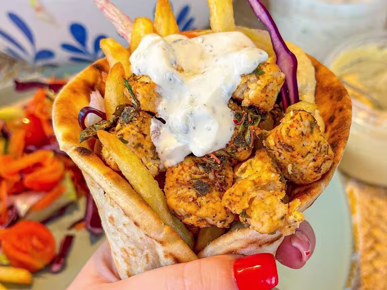 Greek-style flatbread packed with chips, marinated Quorn Vegetarian Chicken Pieces, salad, hummus and tzatziki.