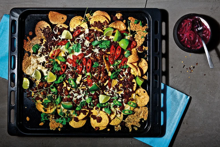 Loaded vegetarian nachos with Quorn Mince, chilli, cheese, lime and coriander
