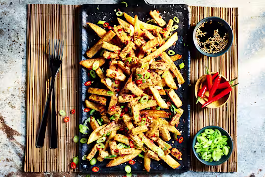 Chips topped with Quorn Steak Strips, spring onions, and chilli.