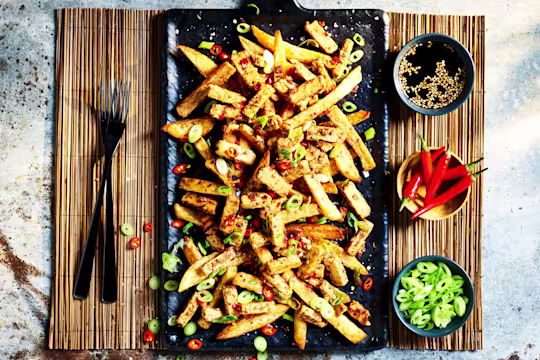 Chips topped with Quorn Steak Strips, spring onions, and chilli.