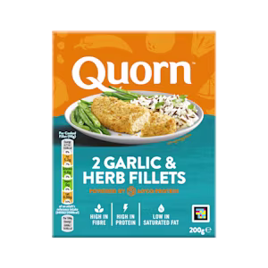 A box of Quorn Garlic & Herb Fillets showing the prepared product and information on an orange and charcoal background.