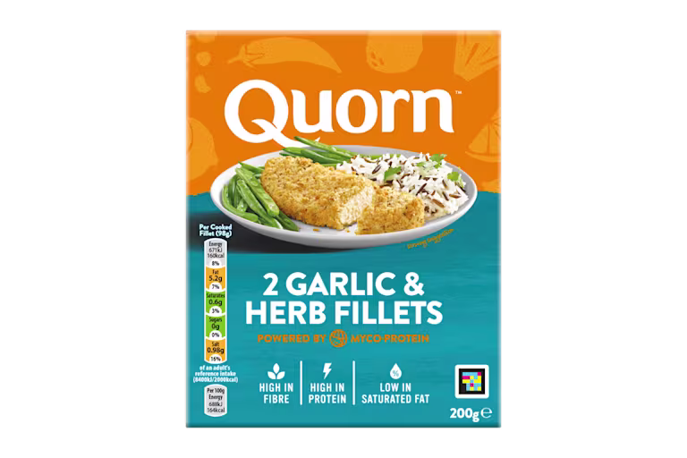 A box of Quorn Garlic & Herb Fillets showing the prepared product and information on an orange and charcoal background.